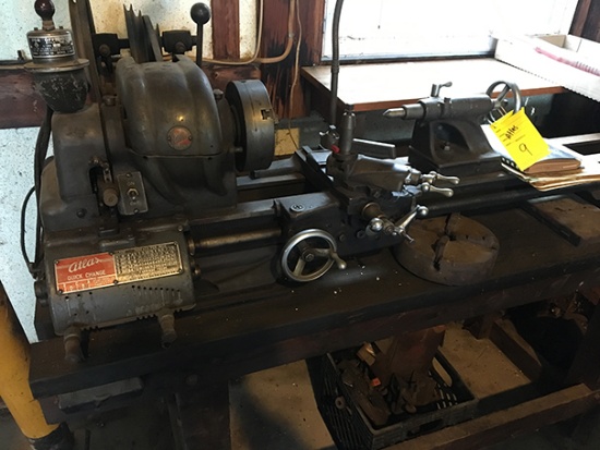 Atlas QC54, 10in quick change metal lathe, 3in and 4in jaw chucks, box of accessories