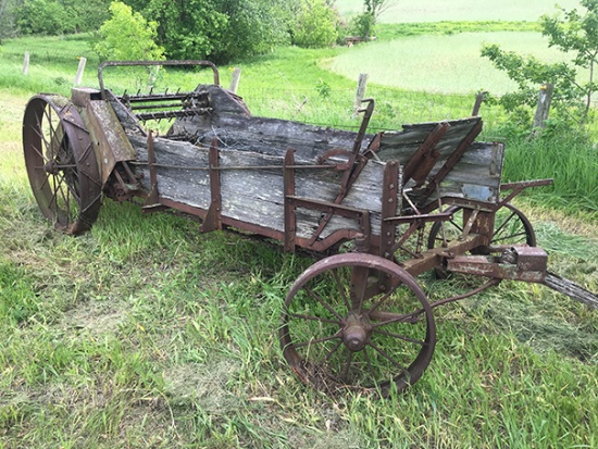 Steel wheel manure spreader, poor condition