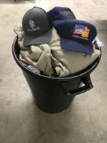 Trash Can Full of Mans Clothing & Hats