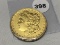 1883 Gold Colored Morgan Dollar, BU-Laqured