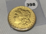 1883 Gold Colored Morgan Dollar, BU-Laqured