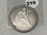 1873 Seated Liberty Dollar