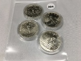 Lot of (4) 1986-P Ellis Island Dollars (90% Silver)