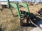 JD 48 loader with bale prong