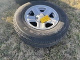 Like new 225/75R16 tire on jeep, 5 bolt rim
