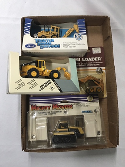 Lot of 4 Ertl, 1/64 Scale, Cat, John Deere, Ford