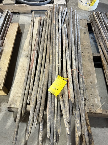 Pile of Long Steel Stakes