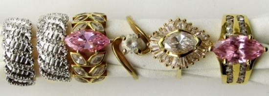 6-BLING RINGS WITH CZ & PINK STONES. LOOKS NEW!