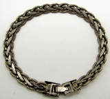 7 INCH STERLING BRACELET WITH BRAIDED DESIGN