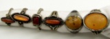 6-STERLING RINGS WITH VARIOUS ORANGE STONES