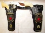 2 VINTAGE PONY BOY TOY CAP GUNS WITH HOLSTERS