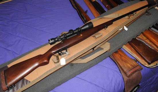 1947 Mauser bolt action rifle with scope