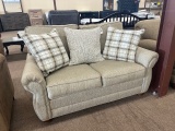 Beige Love Seat w/ Decorative Pillows