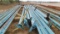 (2) SETS 4- EA GROUND LAY DOWN PIPE RACKS LOCATED IN YARD 2 MIDLAND, TX PIC