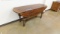 (639)DROP LEAF ROUND TABLE  LOCATED IN YARD 1 - MIDLAND, TX *MUST BE PICKED