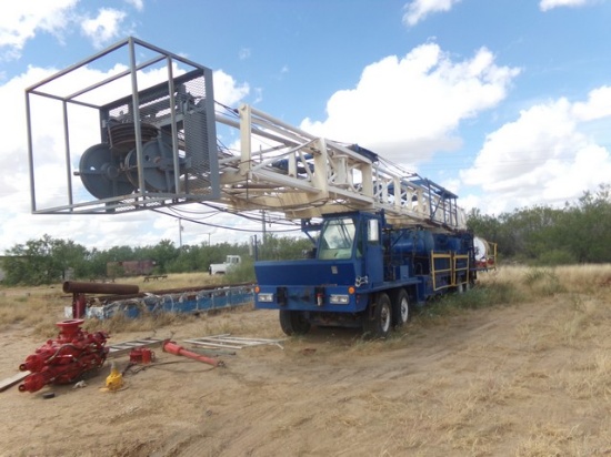 LOCATED IN YD 13 CARRIZO SPRINGS, TX (2069) SKYTOP 450 D/D BACK IN W/S RIG P/B D