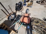 (WS-1) (2) PALLETS WHEELBARROWS AND PIPE STANDS