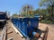 7'W X 5'H X 28'L W/ 4' COVERED PORCH 3-COMPARTMENT MUD VOLUME TANK W/ MIXING HOP