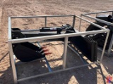 UNUSED BACKHOE ARM ATTACHMENT FOR SKID STEER