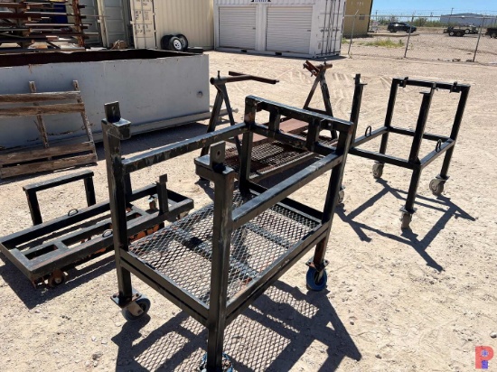 FOUR ROLLING TONG WORK STANDS