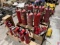 PALLET OF USED AND UNUSED FIRE EXTINGUISHERS AND MOUNTING BRACKETS
