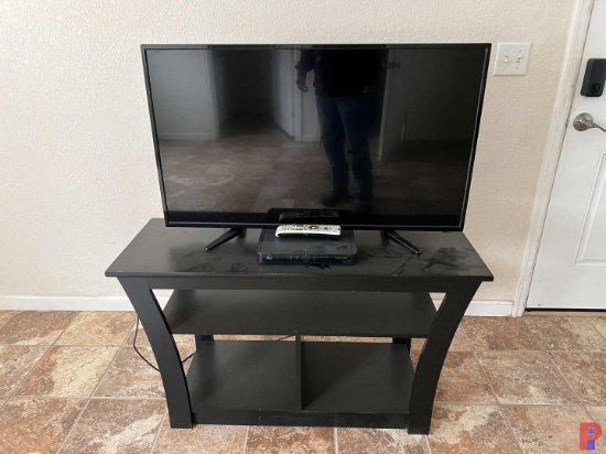 44"L X 16" WIDE TV STAND W/ 42" SEIKI TV, FOLDING CHAIRS, 6' TABLE, OFFICE CHAIRS