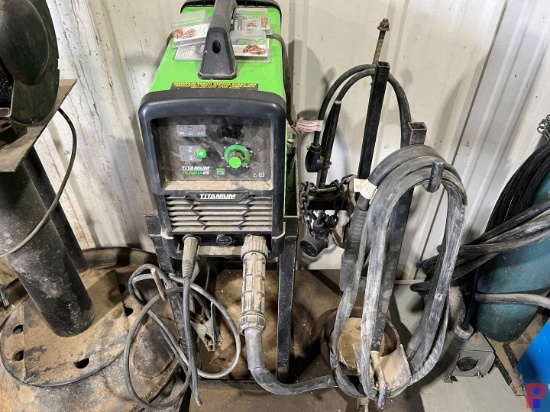 TITANIUM 65 AMP PLASMA CUTTER W/ ACCESORIES & ROLLING STAND
