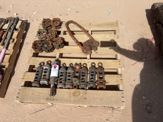 Pallet w/ (7) rod tong heads, (8) rod transfers, & (1) plate type rod elevator
