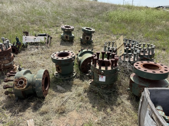 ROW / SECTION OF (7) MOSTLY 11 x 2-1/16 10M CASING HEADS, GATE VALVES, CROSSES, TEES, ADAPTER SPOOLS