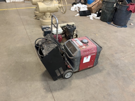 Honda eu3000is inverter generator, stark monster battery charger, & ingersoll Rand S9-8 air compress