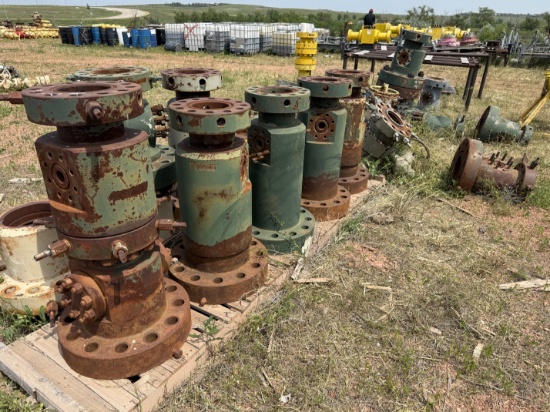 LOT W/ (13+) MOSTLY 7-1/16 x 2-1/16 10M TUBING HEAD SPOOLS & RELATED, (2) TRANSPORT SKIDS & RACKS