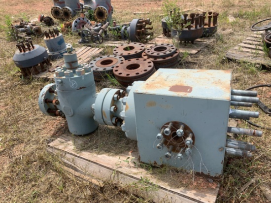 Row of 7-1/16 DSAs, 4-1/16 10k Gate Valves, Well Heads, 2in Fluid Crosses