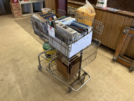 Shopping cart full of assorted oilfield equipment catalogs