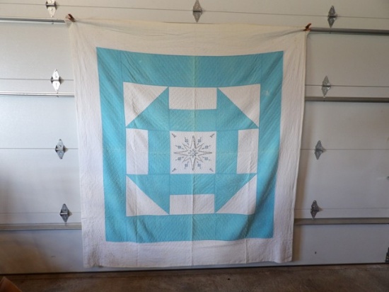 Quilt with small tear