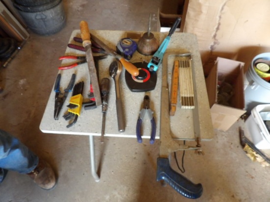 Saw, Allen Wrench, Tape Measure, Ratchet, Side Cuts, Oil Can, Misc Tools