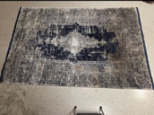 Vintage-style distressed area rug