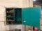Lot of Metal Wall Cabinet and Contents, First Aid Kit and Eye Wash Station.