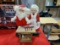 Santa & Mrs. Claus at his workbench