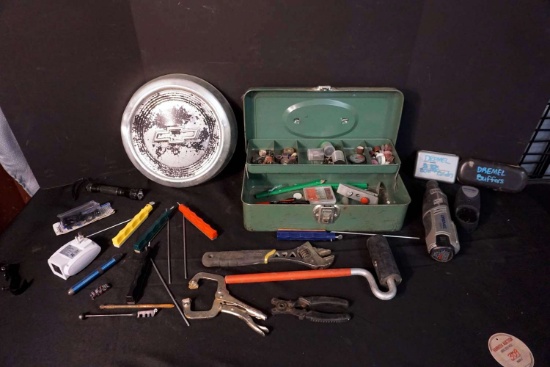 Screws. Toolbox, hubcap, tools