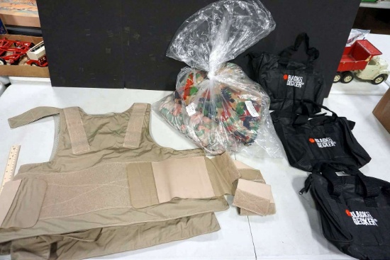 Low visibility body armor vest, jacket with backpack.  Black and Decker tool bags.