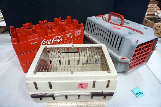 Pet crates and Coca Cola crates.