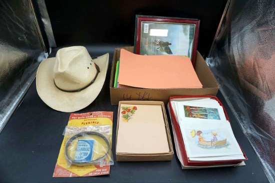 cowboy hat, stationary, picture frame.
