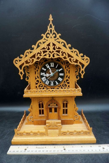 Ornately carved clock.