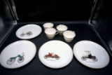 Plates with pictures of cars, saucers, 23 karat gold trim.