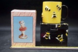 Bumblebee coffee mug, cat figurine. Department 56.