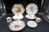 hand painted cups, saucers, creams, plates.