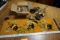 Painted tapestry with Retro 70s vibe, clothespins, brass, butterfly artwork.