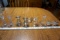 Assorted glass candle sticks.