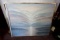 Large painting in brass frame.