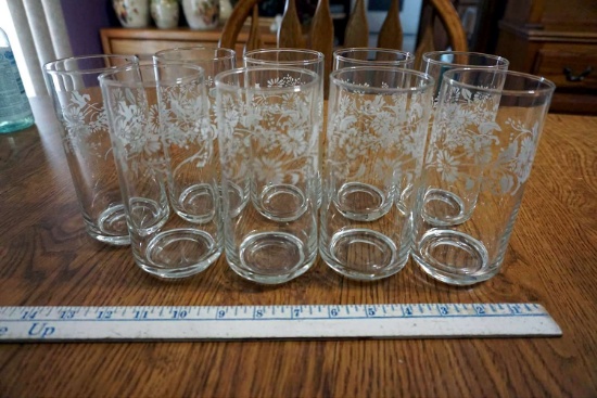 9 matching glass cups.